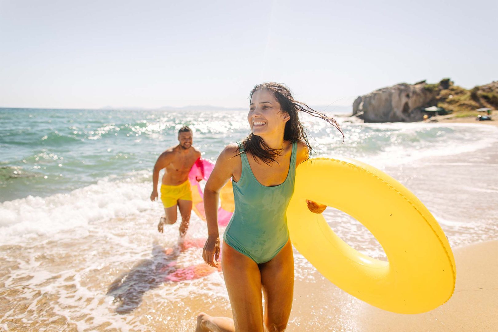 smiling couple at the beach